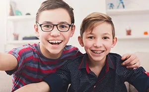 smiling boys at dental office